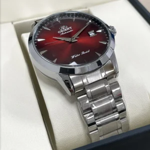 Red dial automatic watch.