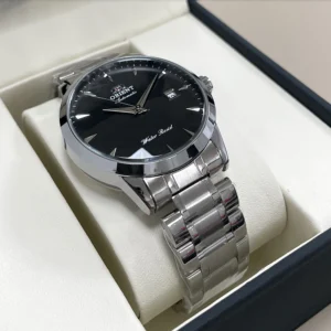 Silver automatic watch with black dial.