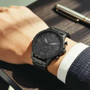 Black chronograph watch on wrist