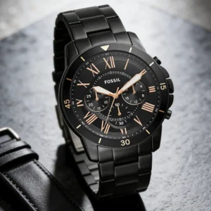 Black metal watch with rose gold details