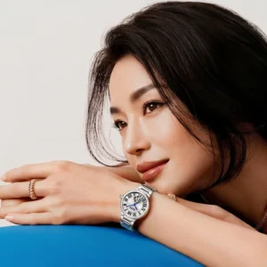 Woman wearing a silver watch.