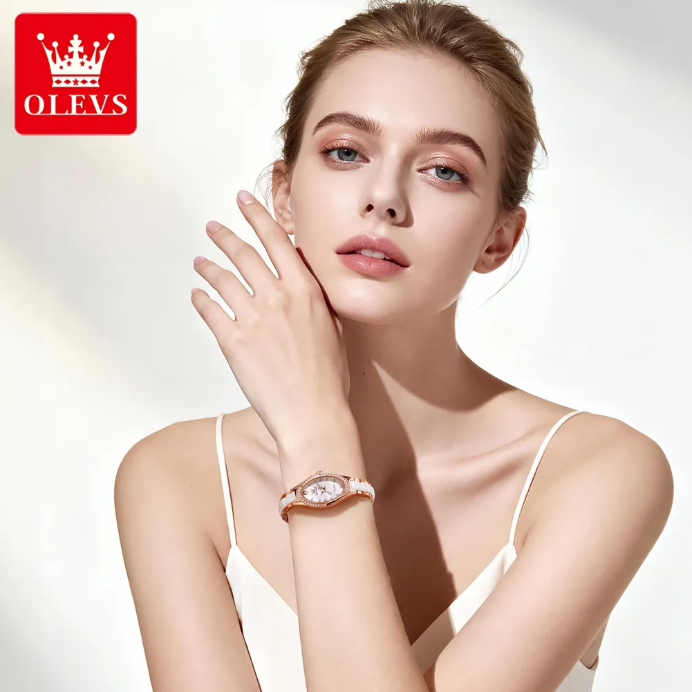 olevs brand new quartz watch for woman elegant luxury ceramics steel strap fashion oval diamond dial women's waterproof watches Elegant woman wearing OLEVS watch