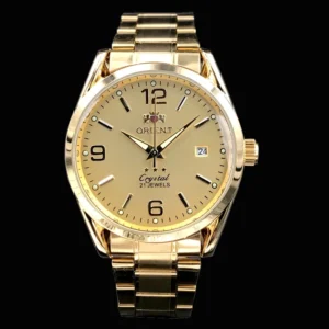 Golden analog watch with date