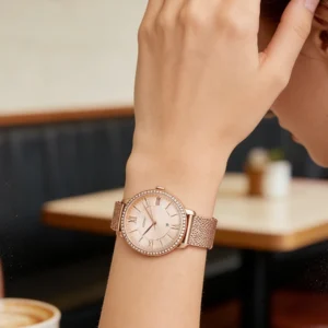 Rose gold mesh watch.