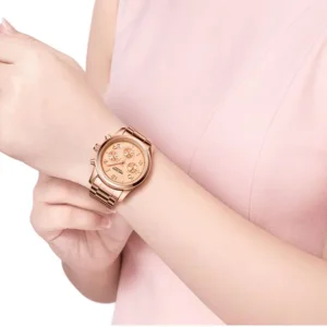 Rose gold watch on wrist