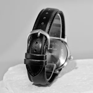 Black leather watch band detail