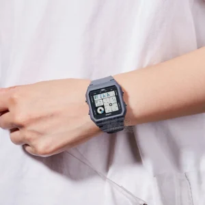 Grey digital watch on wrist