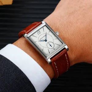 Rectangular watch on wrist.