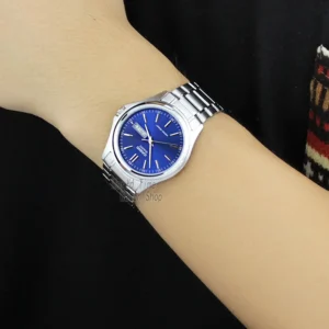 Blue faced analog wristwatch.