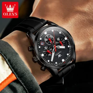 black chronograph watch on wrist