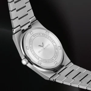 Stainless steel watch caseback details.