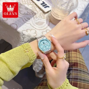 Light blue watch on wrist.