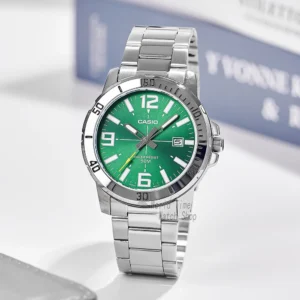 Green faced steel watch