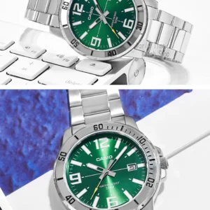 Green dial steel watch.