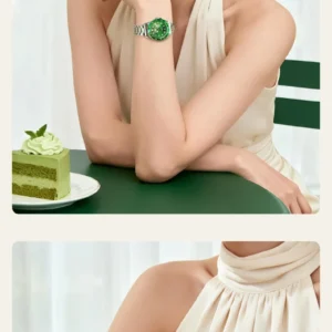 Woman wears green gemstone watch.