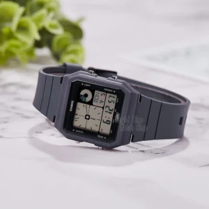 Grey digital watch with analog display