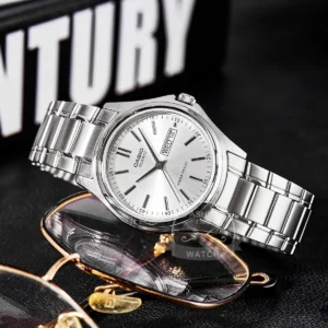 Silver analog watch with day.