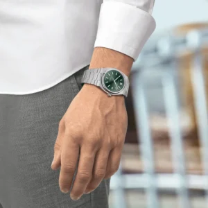 Green dial metal watch