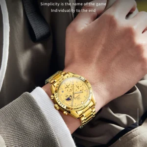 gold watch on man's wrist